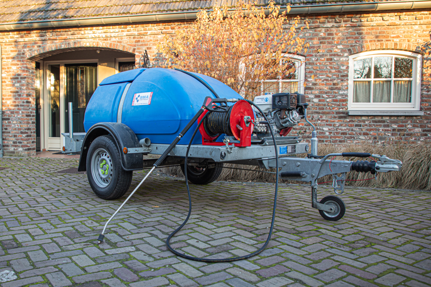 koudwater met benzine motor en voorraad tank aanhanger model